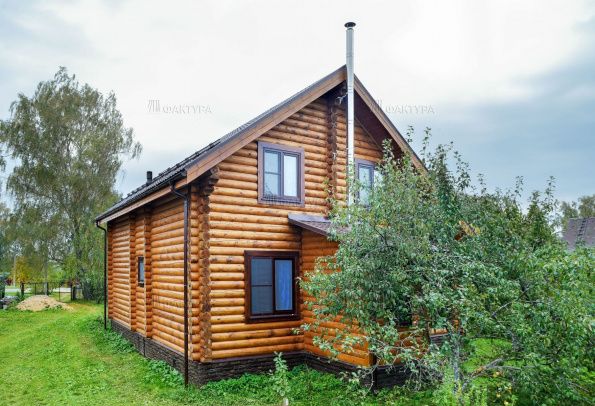 Готовый дом из бревна после отделки