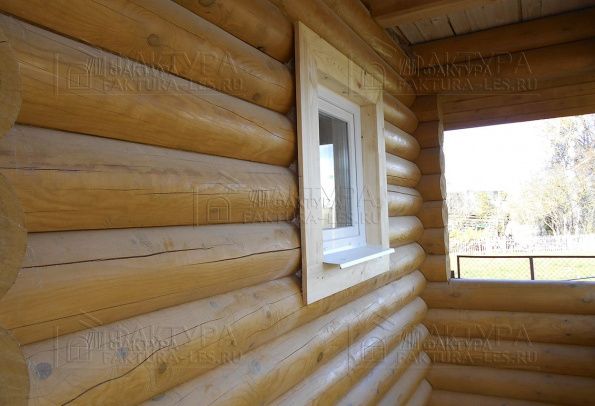 Покраска дома из бревна